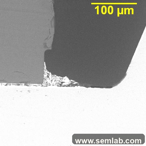 Thermal damage and de-bonding of lens material at the base of an LED cup